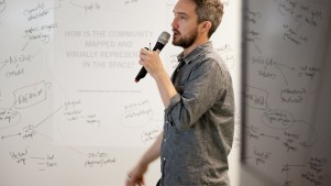 A coworking space should be in perpetual beta, constantly changing to reflect its members. These ideas were drawn from TILT studio's workshop during Coworking Europe 2011. Pictured here is TILT's Oliver Marlow (Image: Stefano Borghi).