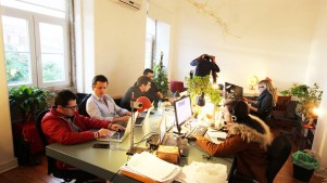 Coworkers hard at work at Cowork Central in Lisbon, Portugal 